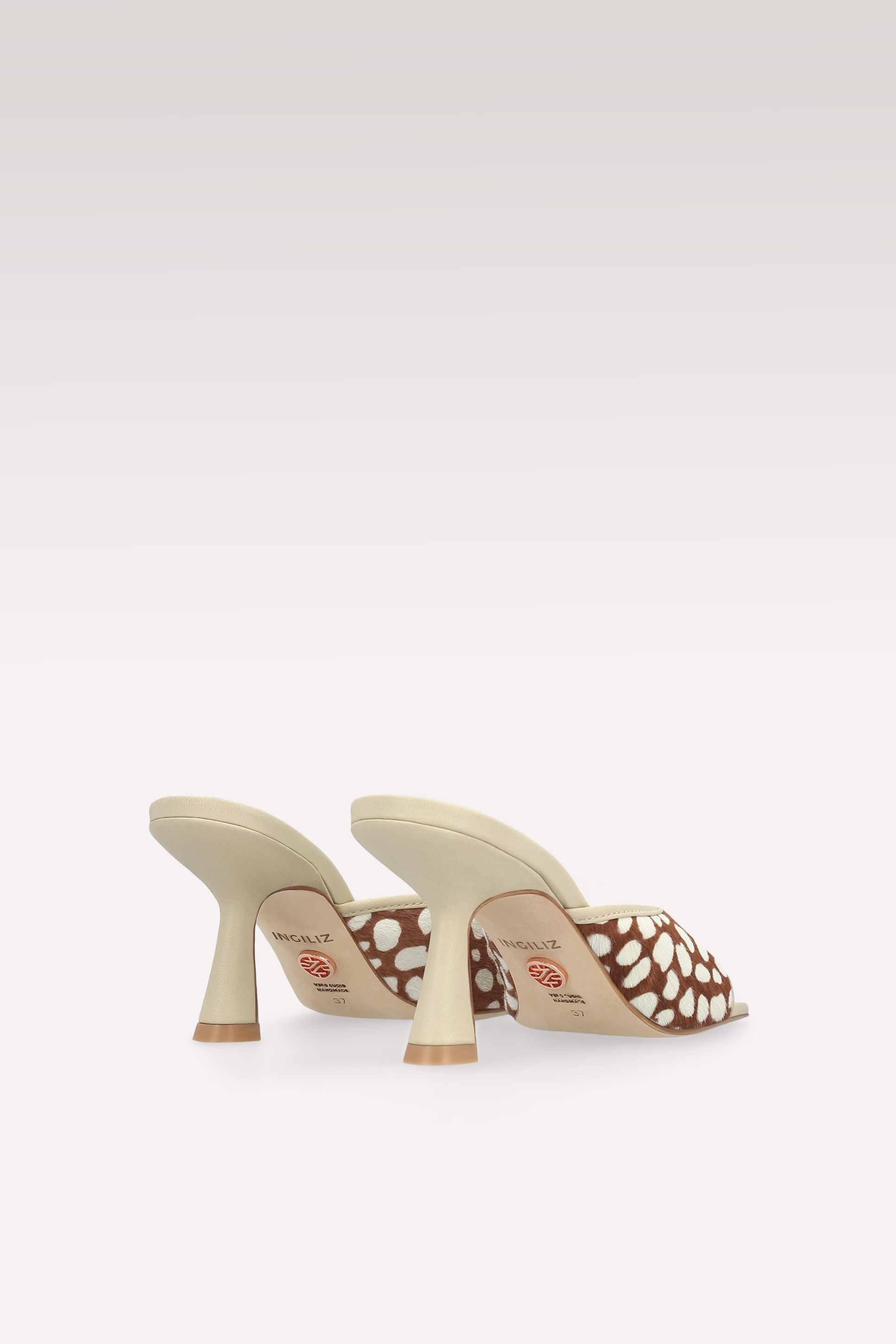 REY CREAM PONY CALF HAIR AND
LEATHER MULES